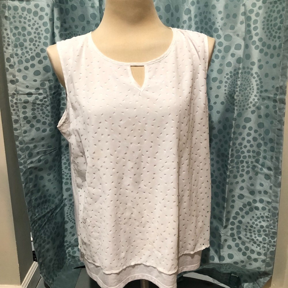 White tank keyhole blouse with geo cutouts